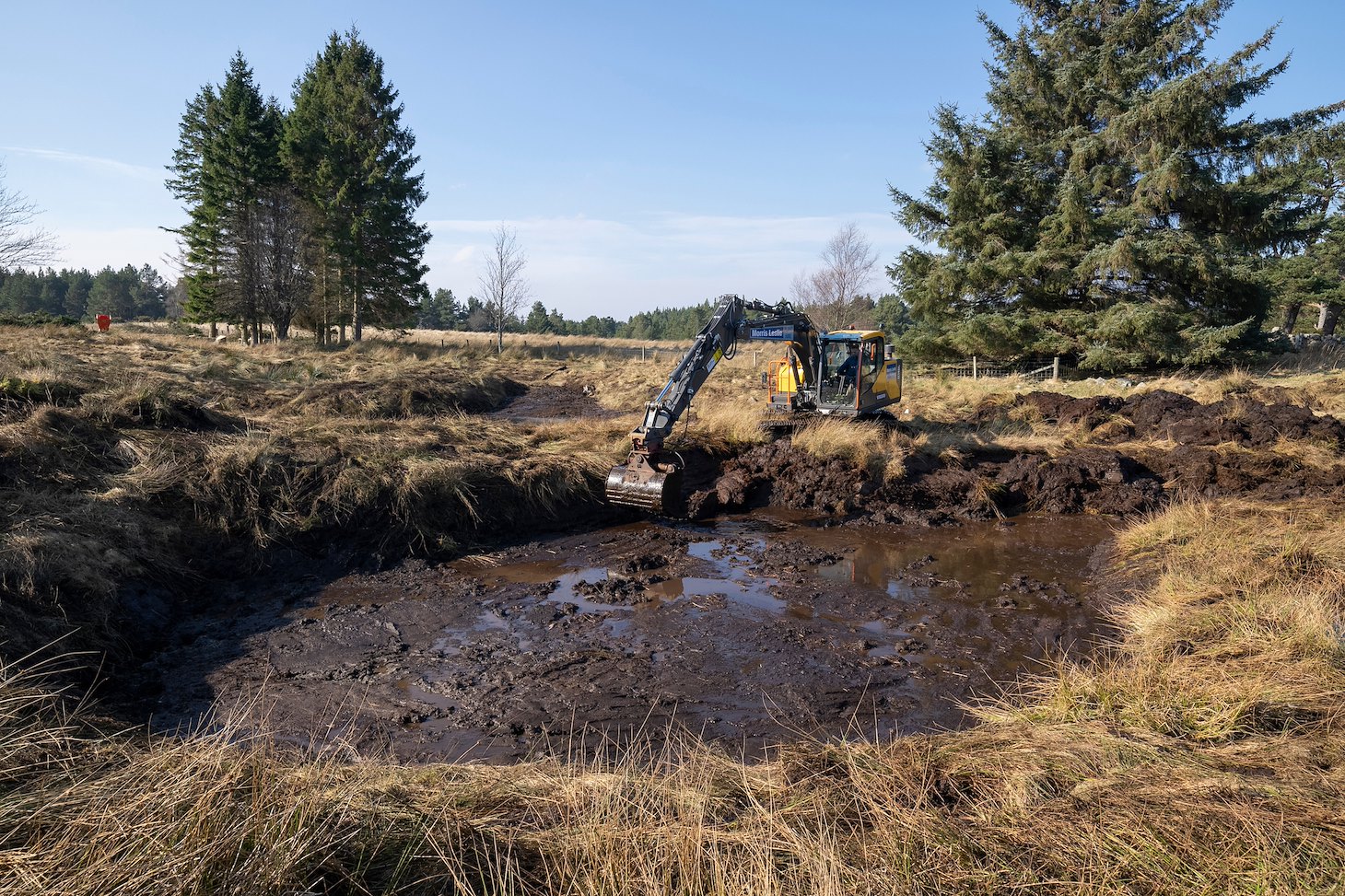 Pond excavation at Northwoods Rewilding Network partner, Lynamer, Cairngorms National Park, March 2022